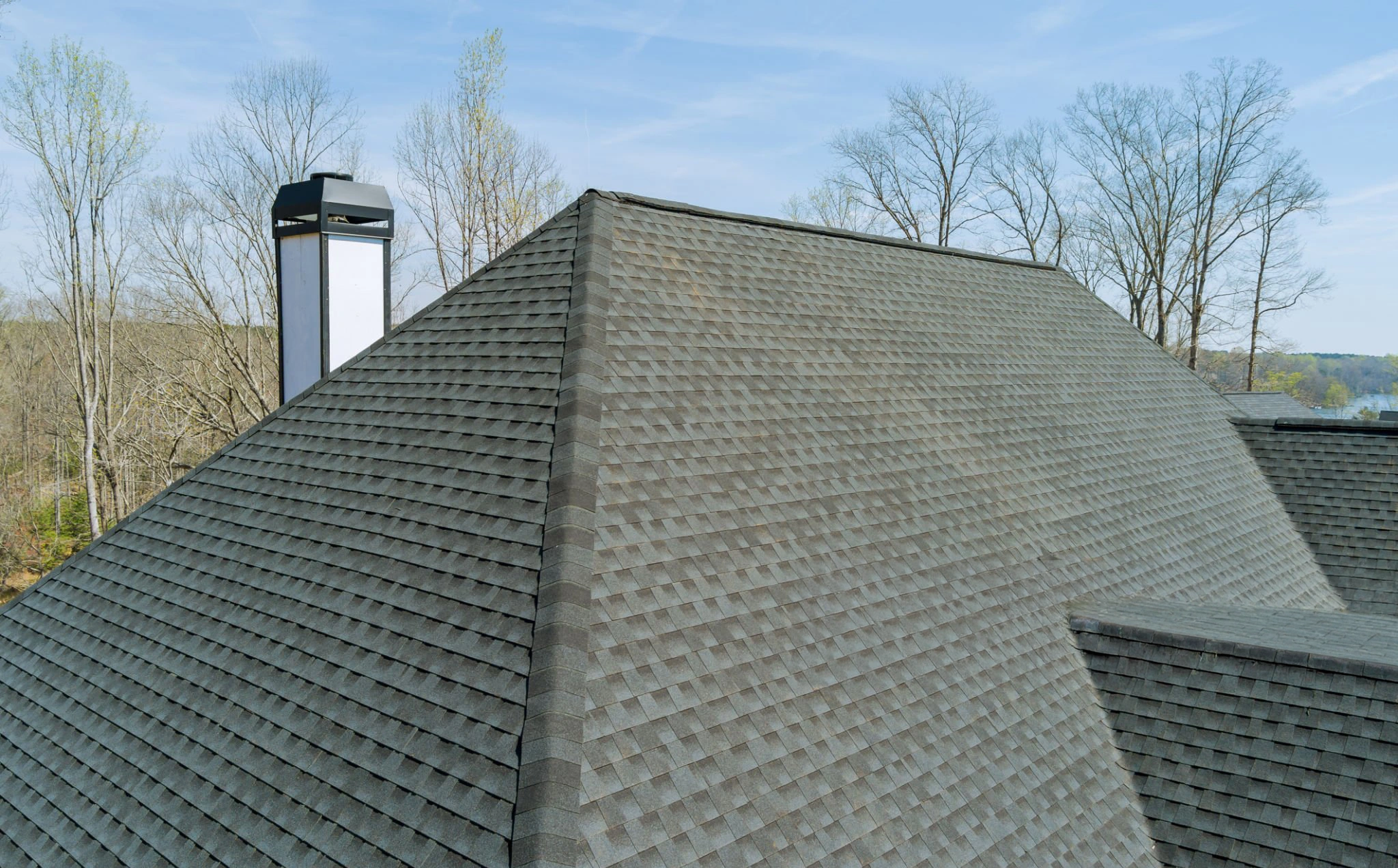 Exterior project setting related to Roofing Services Spring Valley NY with construction work in progress